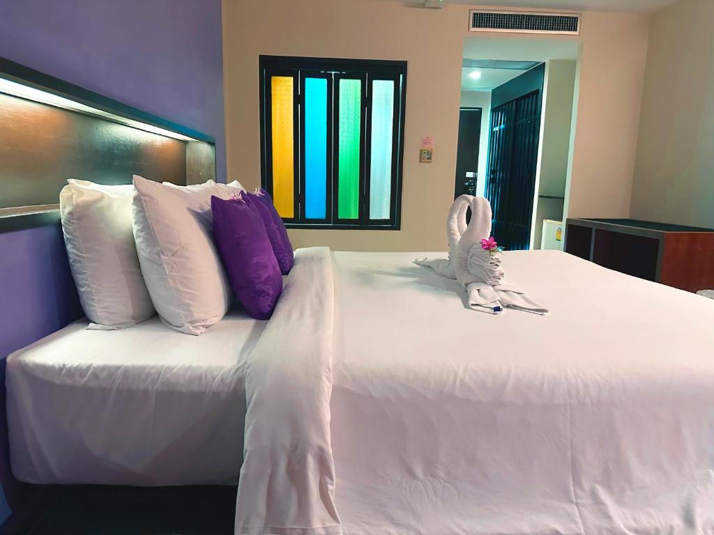 Postel nebo postele na pokoji v ubytování Phuvaree Resort