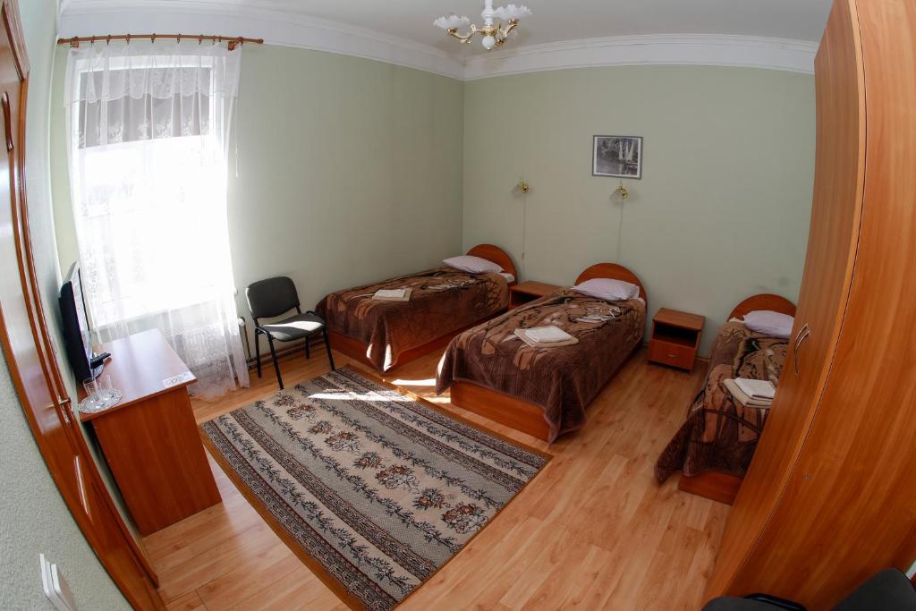 Postel nebo postele na pokoji v ubytování Lucia