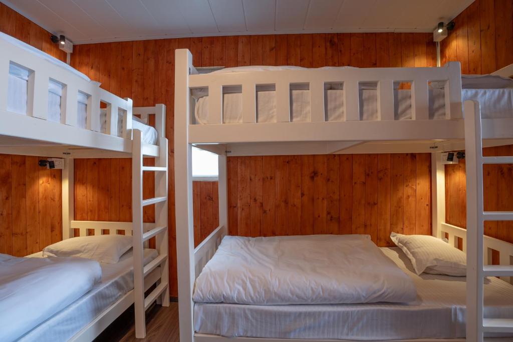 Postel nebo postele na pokoji v ubytování Poshtel, Meghma , Sandakphu