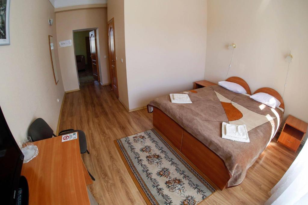 Postel nebo postele na pokoji v ubytování Lucia