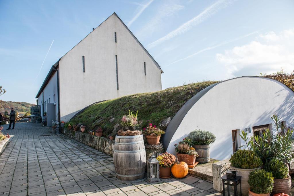 a church with plants in front of it at Remushof Jagschitz in Oslip