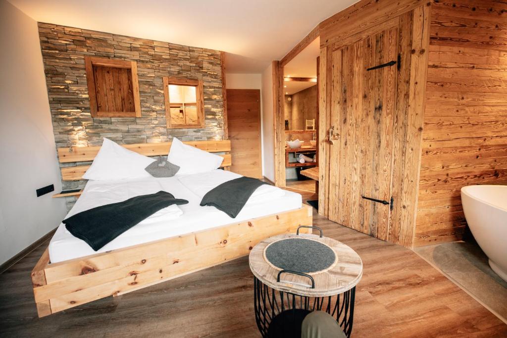 Postel nebo postele na pokoji v ubytování Hotel Sonnberg