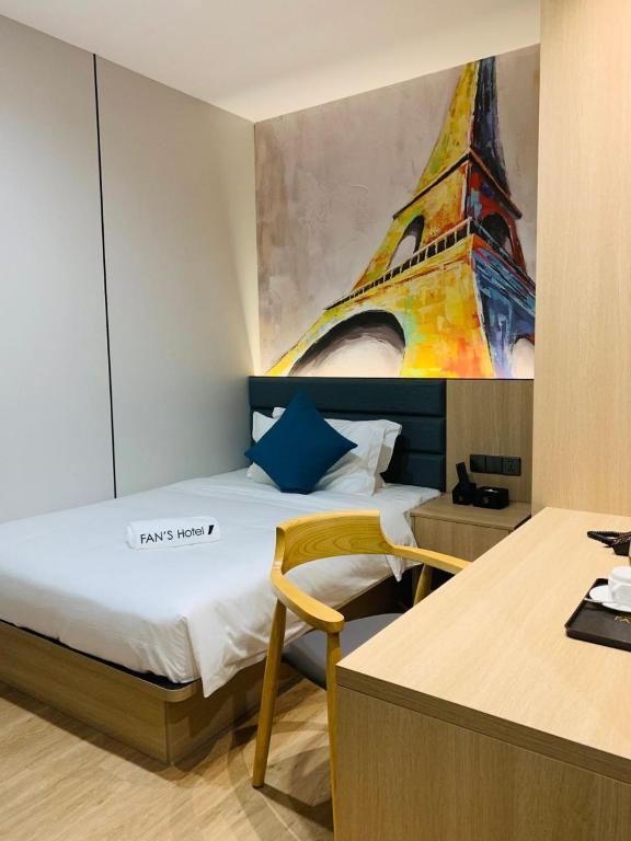 Postel nebo postele na pokoji v ubytování Fan's Hotel Palo