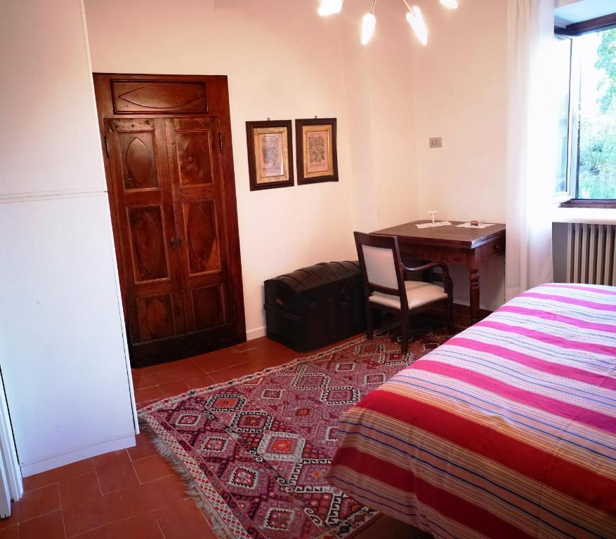 Postel nebo postele na pokoji v ubytování CASA DEL CANTA