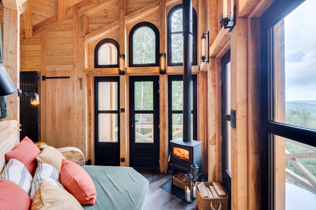 Posezení v ubytování Les cabanes des Dolimarts