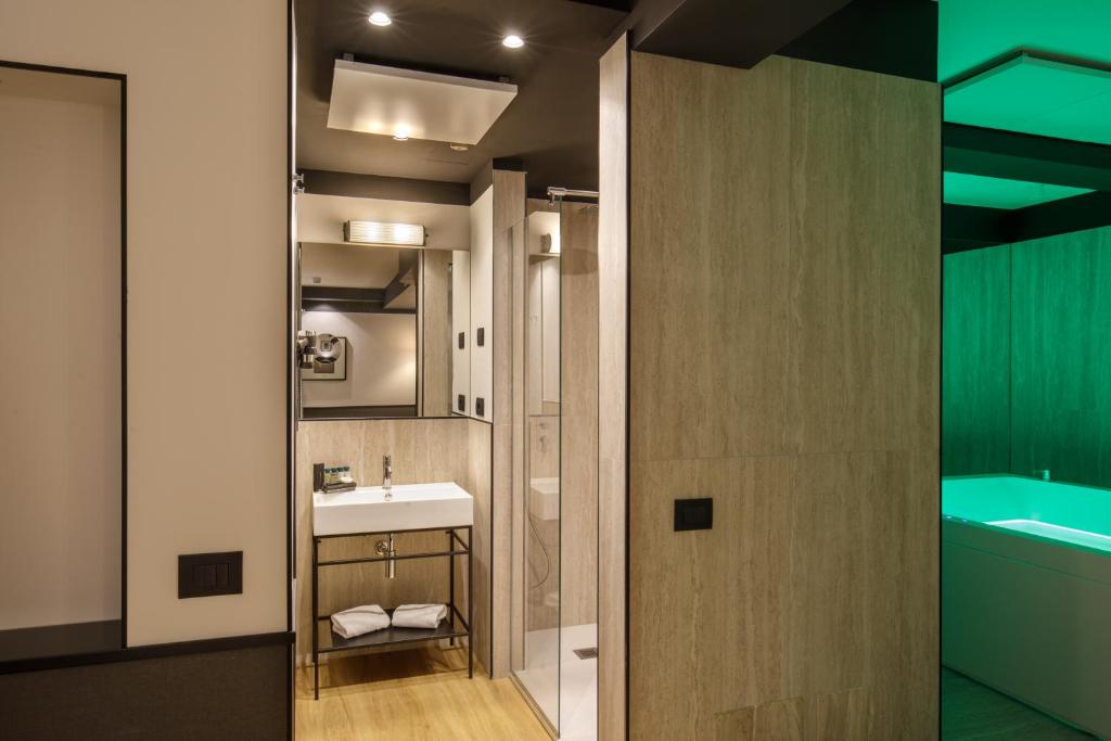 Koupelna v ubytování Hotel Domidea