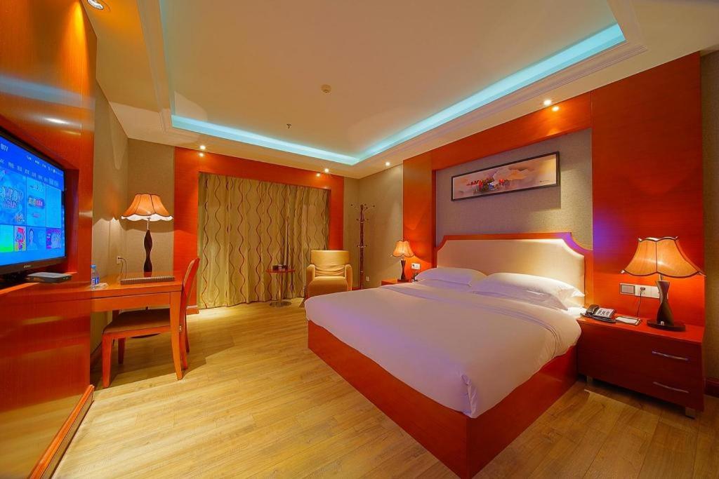 Katil atau katil-katil dalam bilik di Borrman Hotel Guangzhou Tianhe Tangdong Subway Station Convention and Exhibition Center