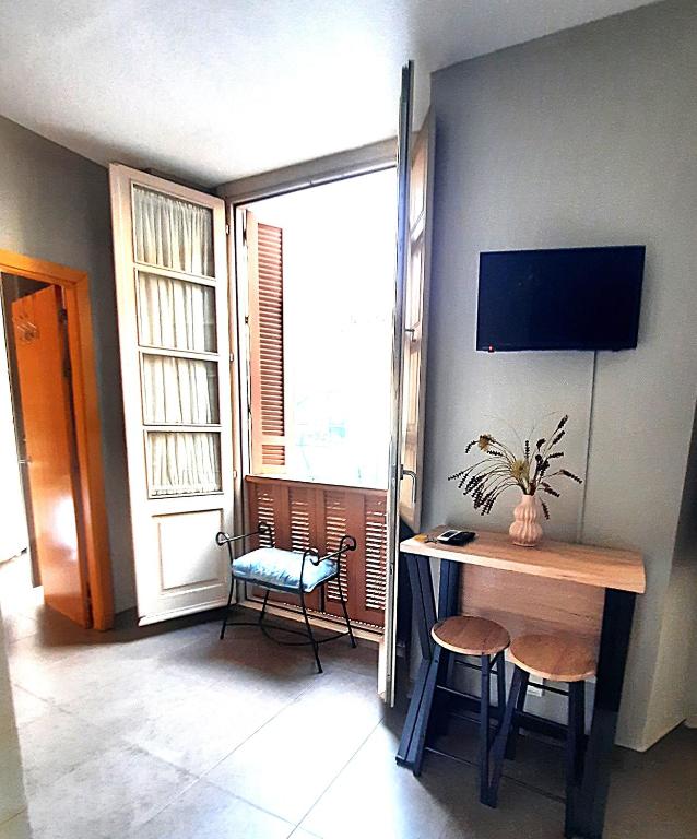 TV a/nebo společenská místnost v ubytování Apartamentos MalagaSol