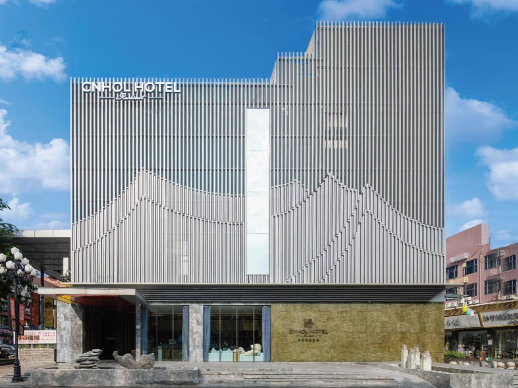 a building with a large building with a building with a large at Zhonghao Boutique Hotel Dalang Business Center in Tiantangwei