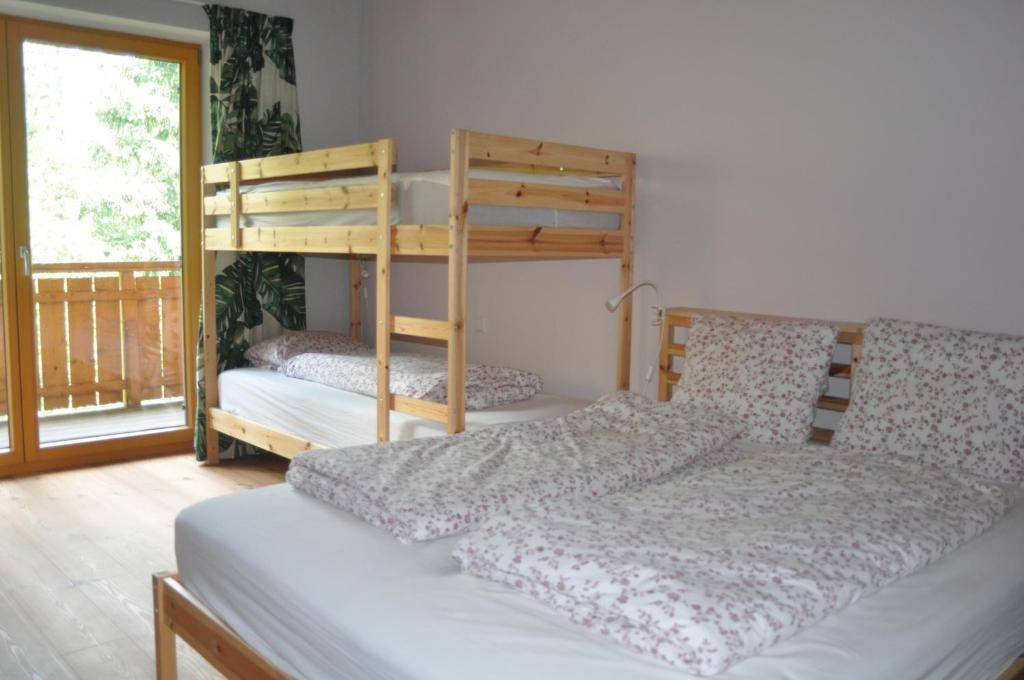 a bedroom with two bunk beds in a room at Appartement Anna Ali in Bad Kleinkirchheim
