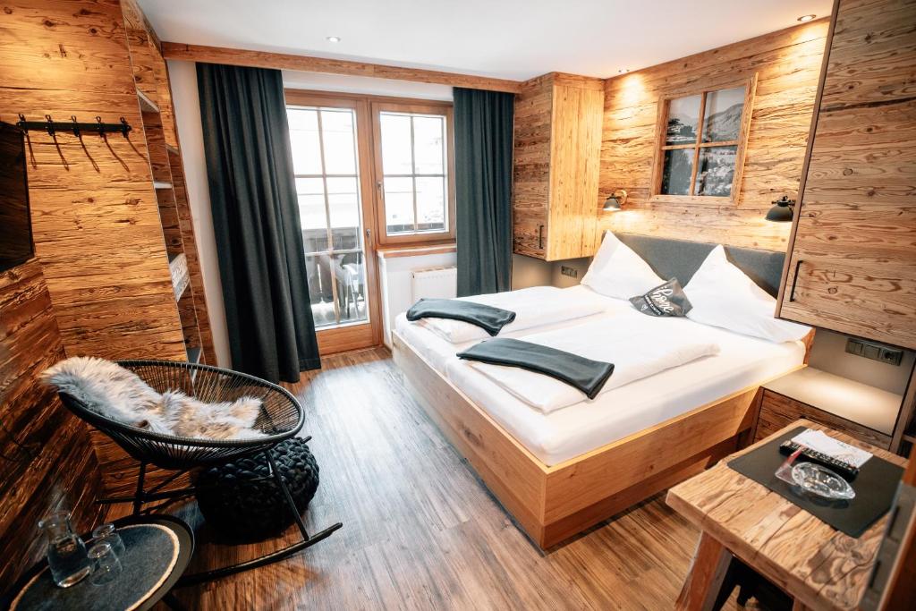 Postel nebo postele na pokoji v ubytování Hotel Sonnberg
