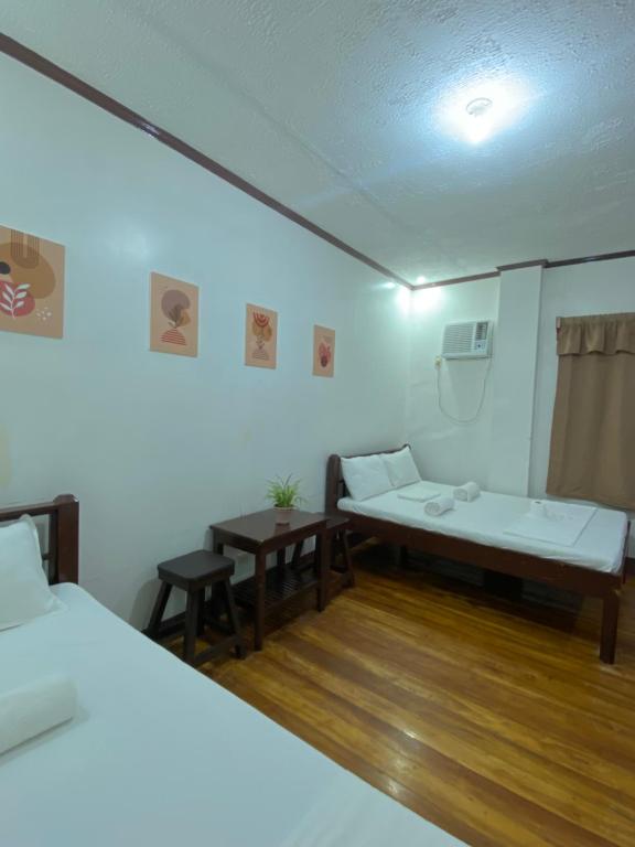 Postel nebo postele na pokoji v ubytování Jala Beach Resort