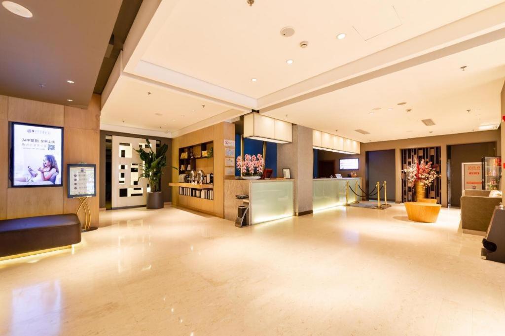 TV a/nebo společenská místnost v ubytování Yitel Collection Shenyang Imperial Palace Zhongjie Metro Station