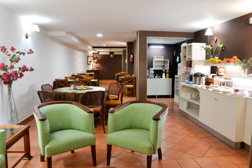 Kuchyň nebo kuchyňský kout v ubytování I AM La Posada Hotel and Apartment