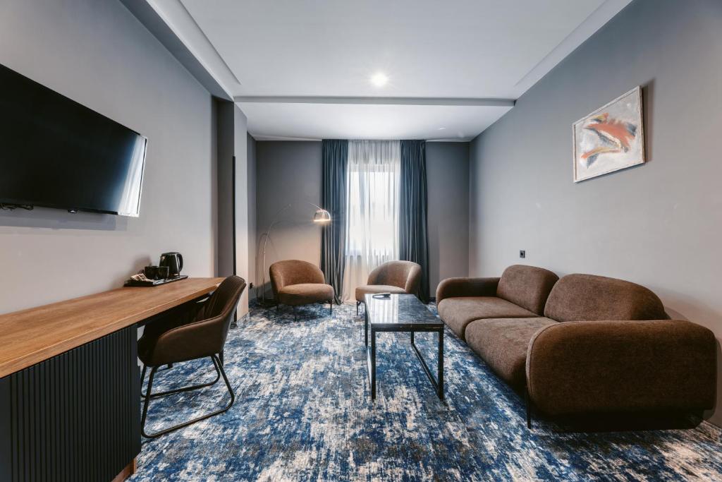 TV a/nebo společenská místnost v ubytování Hotel Splendid Tbilisi