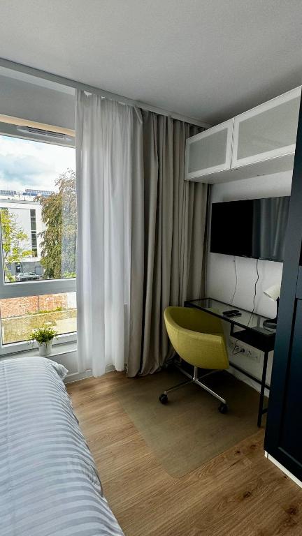 Postel nebo postele na pokoji v ubytování Platon Residence Apartments