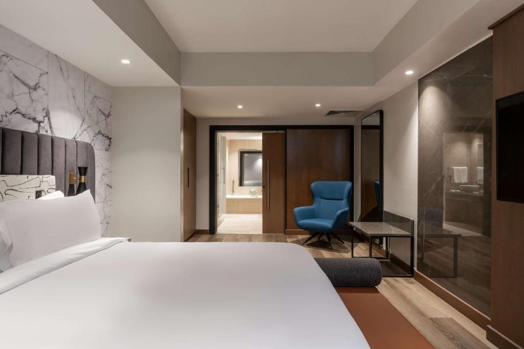 Posteľ alebo postele v izbe v ubytovaní Radisson Blu Anchorage Hotel