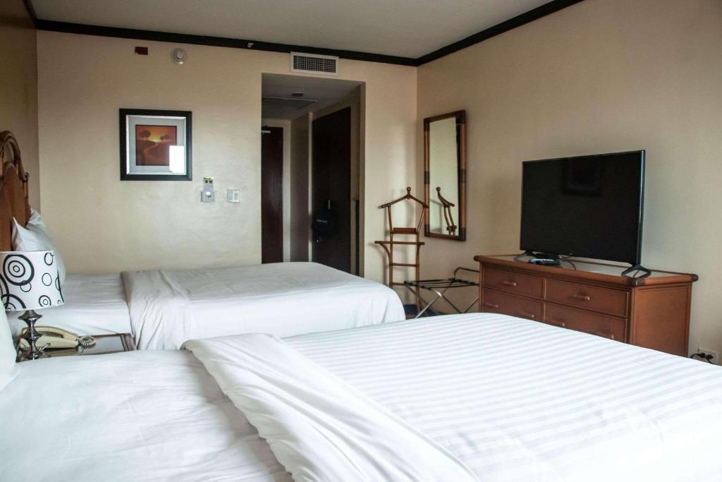 TV a/nebo společenská místnost v ubytování Radisson Colon 2,000 Hotel & Casino