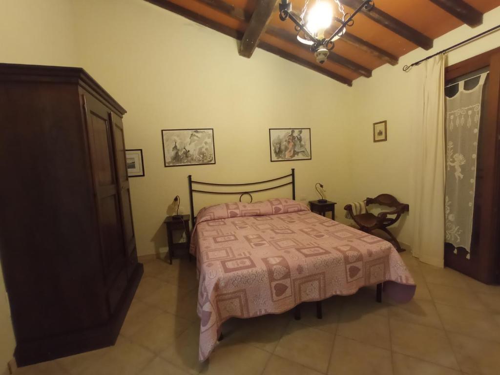 Postel nebo postele na pokoji v ubytování Borgo Antico