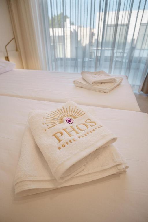 Postel nebo postele na pokoji v ubytování Phos Hotel Adults Only