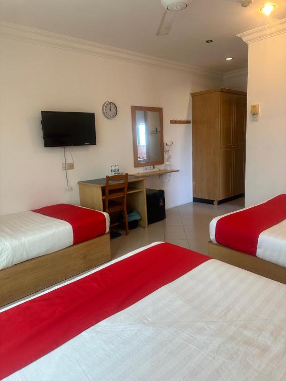 Postel nebo postele na pokoji v ubytování V HOTEL