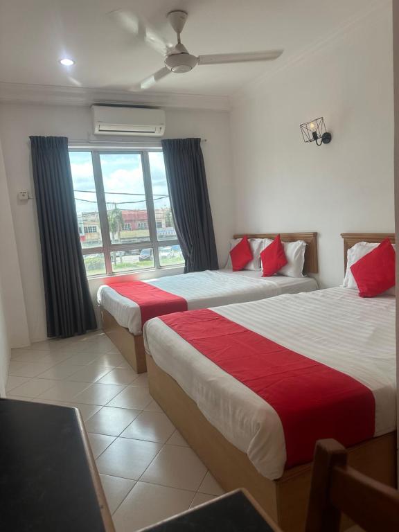 Postel nebo postele na pokoji v ubytování V HOTEL