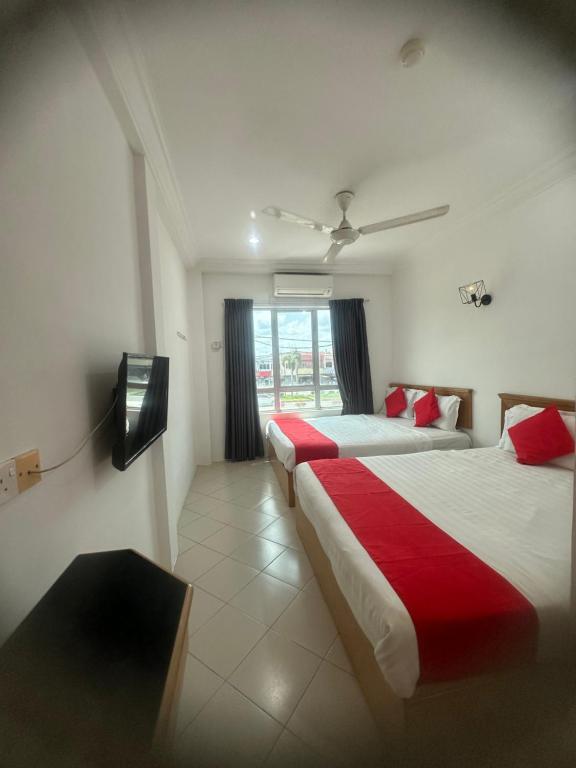 Postel nebo postele na pokoji v ubytování V HOTEL