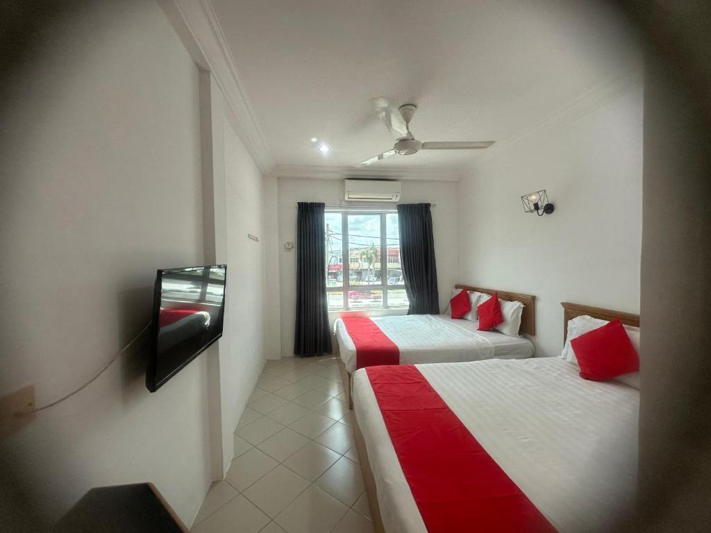 Postel nebo postele na pokoji v ubytování V HOTEL
