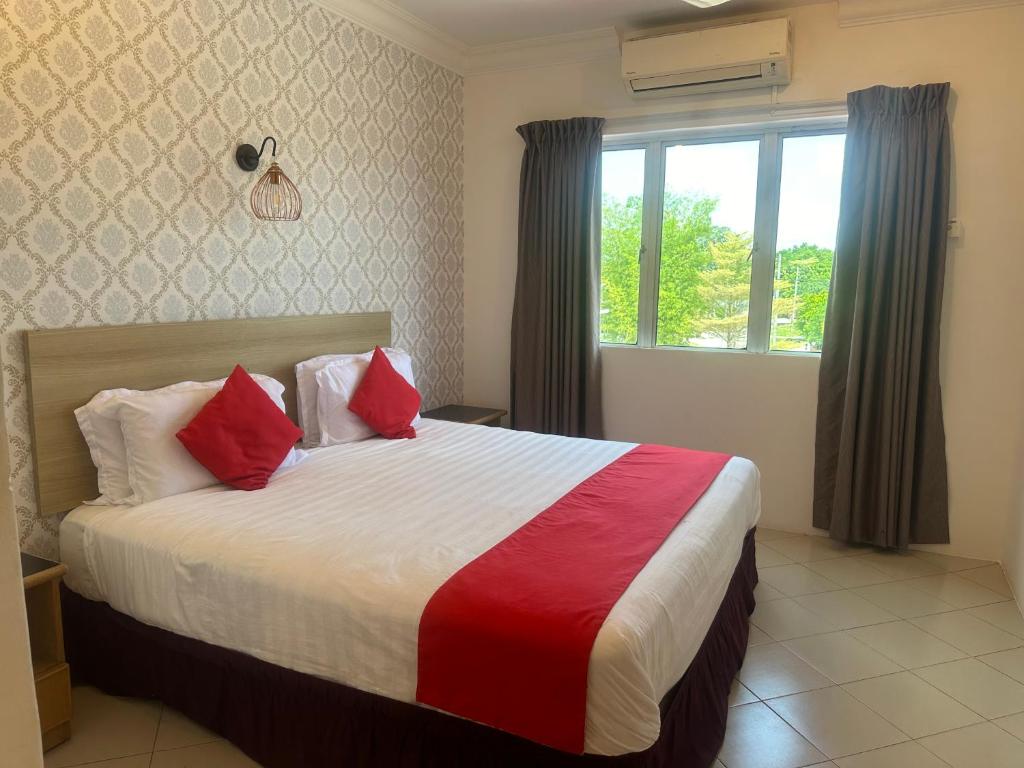 Postel nebo postele na pokoji v ubytování V HOTEL