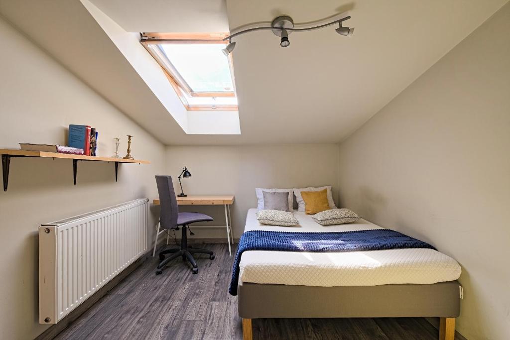 Posteľ alebo postele v izbe v ubytovaní Urban Nest Apartments Radziwiłłowska 14