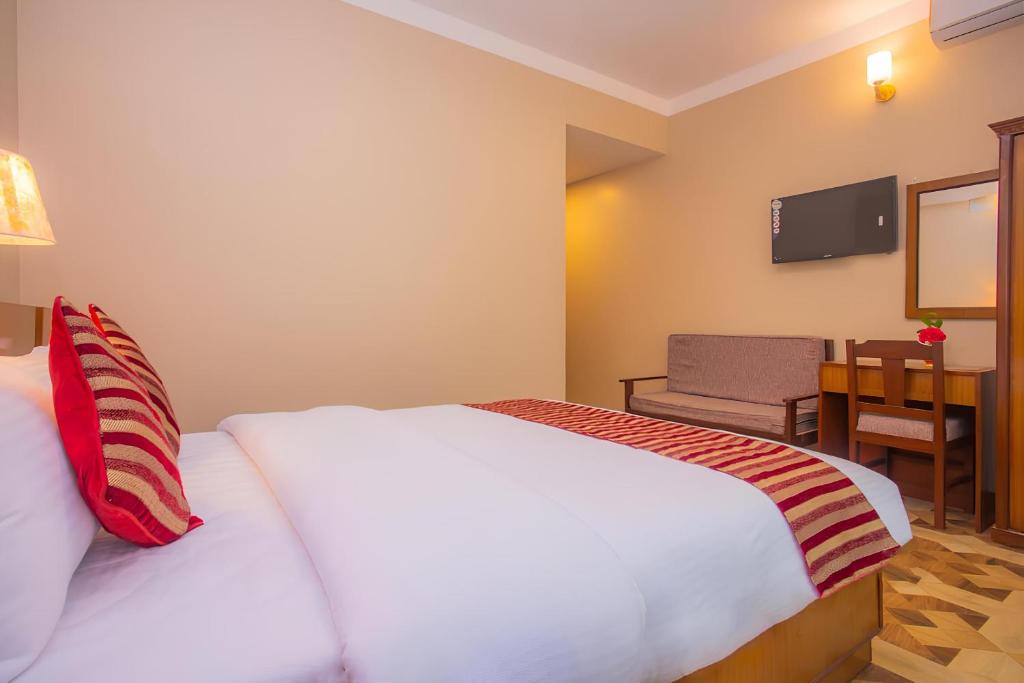 Voodi või voodid majutusasutuse Hotel Liberty toas