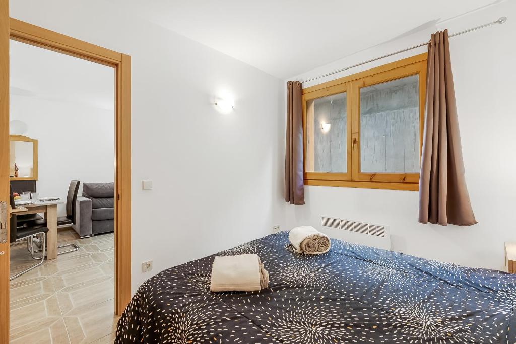 Postel nebo postele na pokoji v ubytování Andorra Active Leisure Apartment - Happy Rentals
