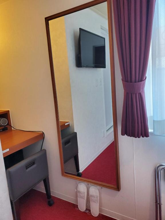 TV a/nebo společenská místnost v ubytování Benikea Calton Hotel Osaka Doutonbori