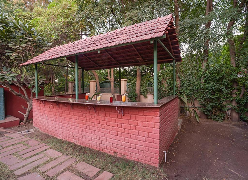 Zahrada ubytování Renest Shraddha Inn - Shirdi