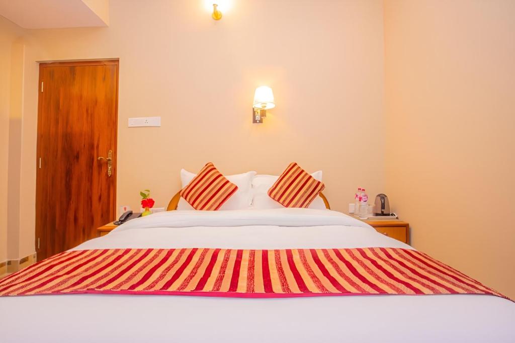 Voodi või voodid majutusasutuse Hotel Liberty toas
