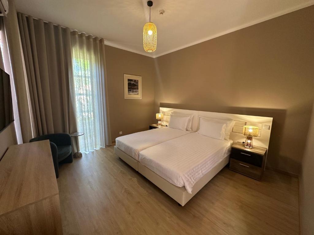 Postel nebo postele na pokoji v ubytování Inn & Art Madeira