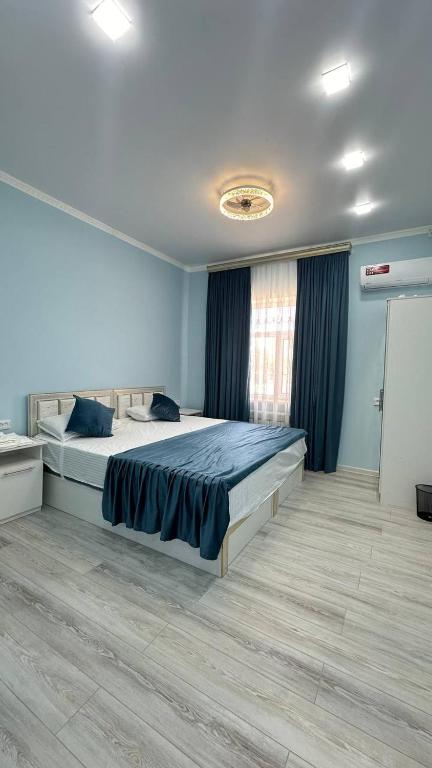 Ένα ή περισσότερα κρεβάτια σε δωμάτιο στο SAFO GUEST House 2