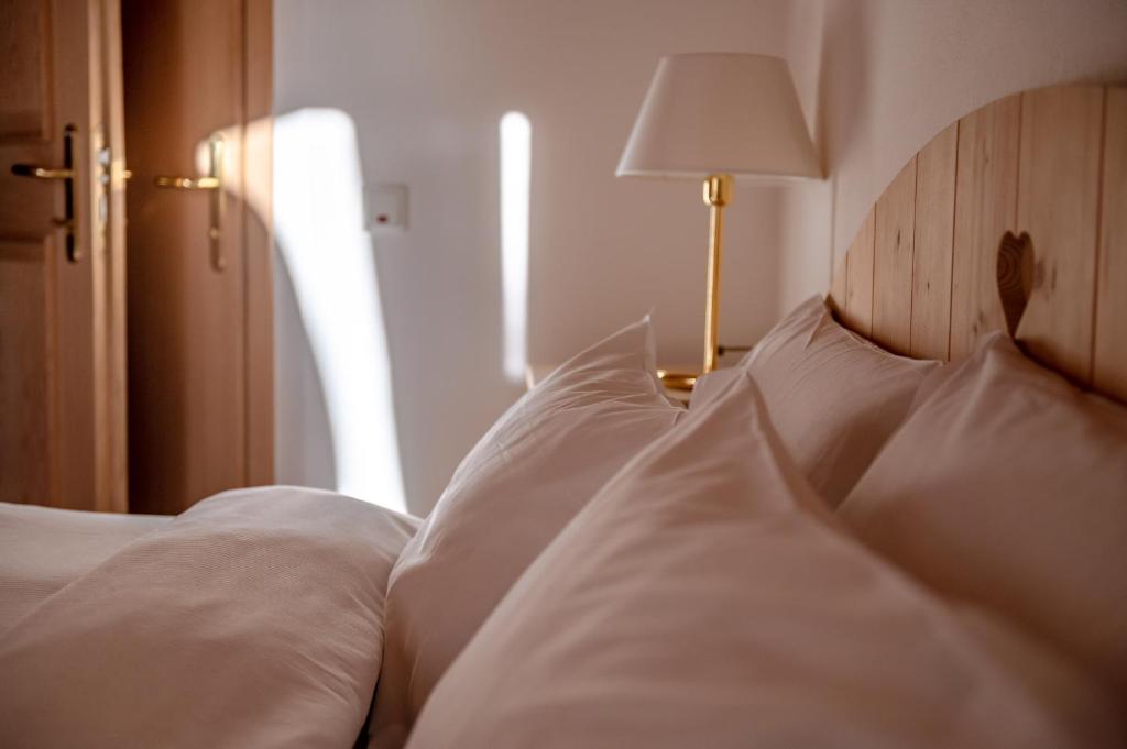 Letto o letti in una camera di Chalet Cima Uomo