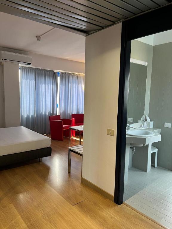 Postel nebo postele na pokoji v ubytování Park Hotel Residence