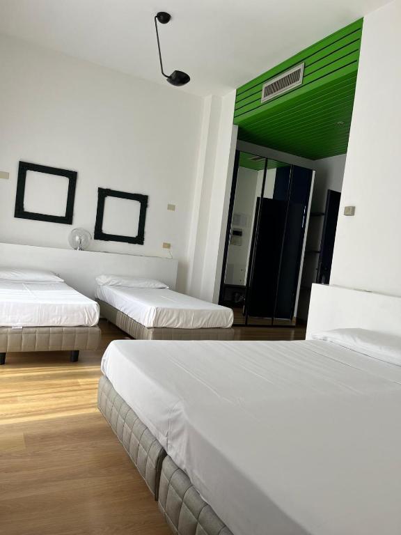Postel nebo postele na pokoji v ubytování Park Hotel Residence