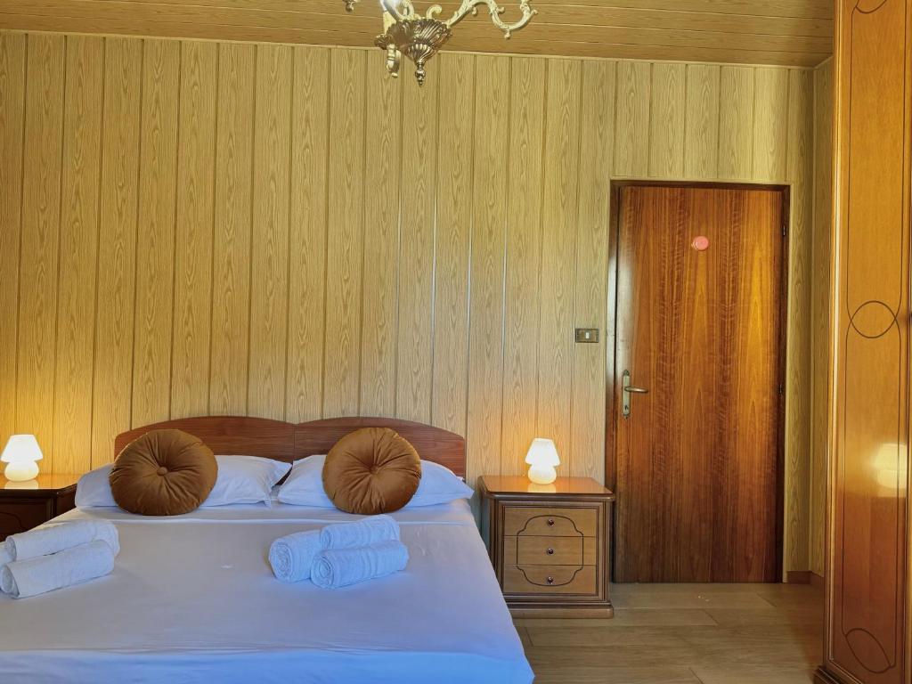 Postel nebo postele na pokoji v ubytování Appartamento centrale Zia Myrna