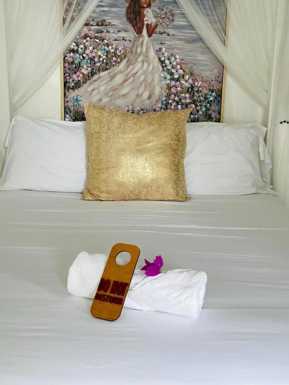 Postel nebo postele na pokoji v ubytování Fogo Boutique Hotel