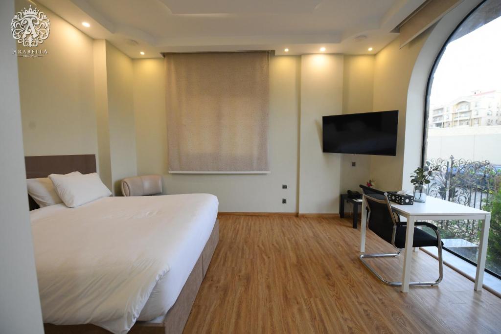 TV a/nebo společenská místnost v ubytování Arabella Residence