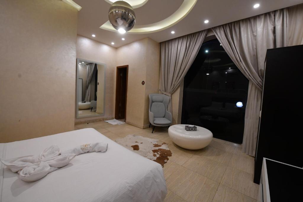 Postel nebo postele na pokoji v ubytování Arabella Residence