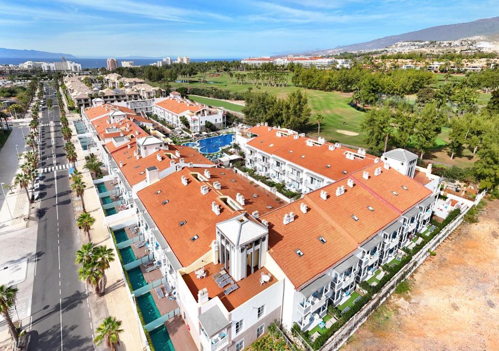 an overhead view of a building with an orange roof at Coral Compostela Beach Golf in Playa de las Americas