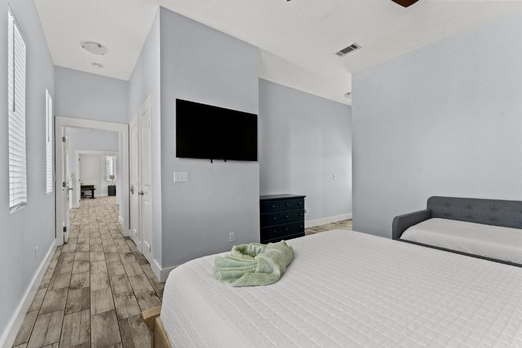 Cama ou camas em um quarto em Goin' Coconuts