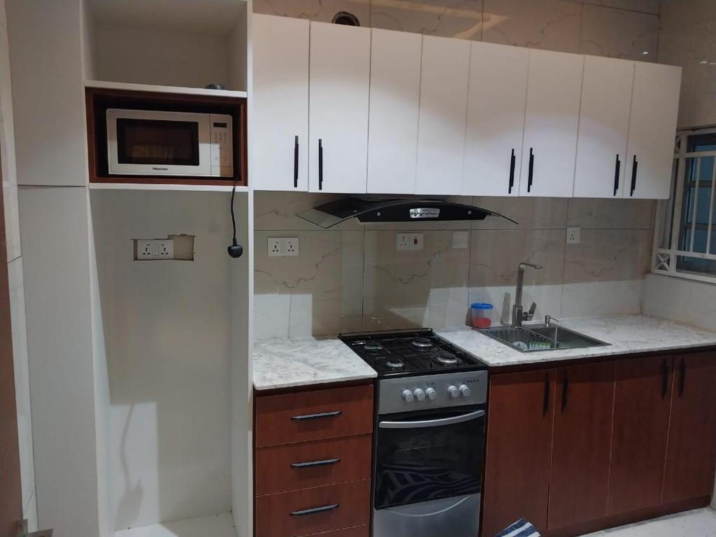 Kuchyň nebo kuchyňský kout v ubytování C apartment