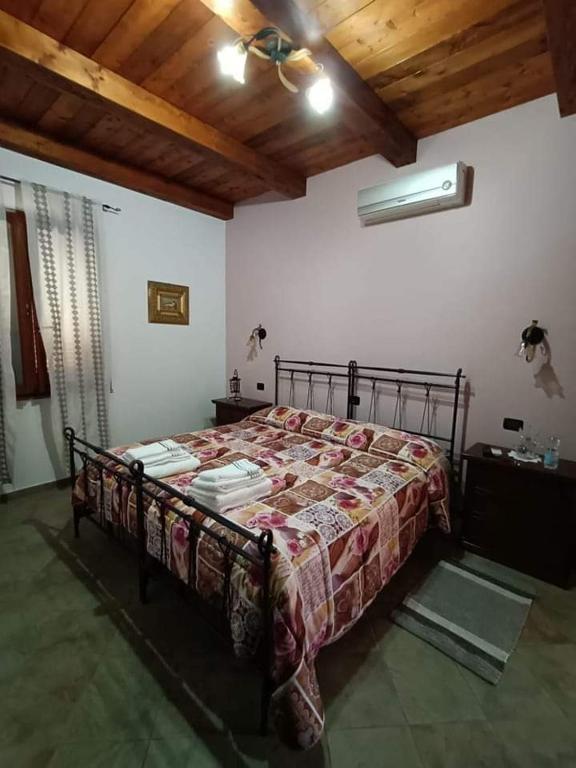 Posteľ alebo postele v izbe v ubytovaní B&B funtanadetalia
