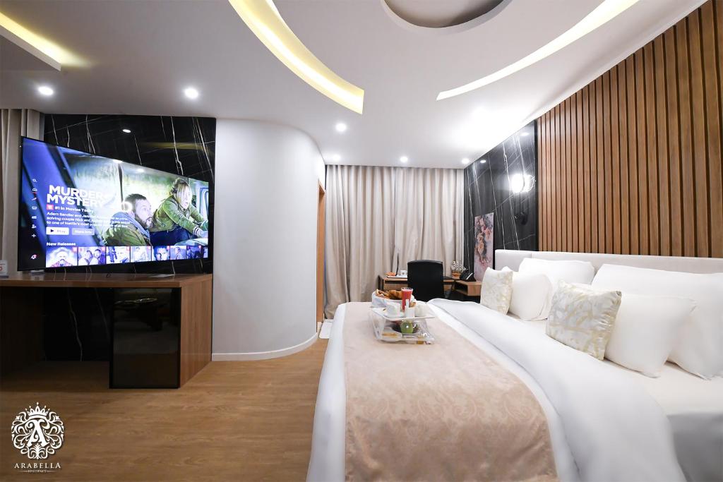 Postel nebo postele na pokoji v ubytování Arabella Residence