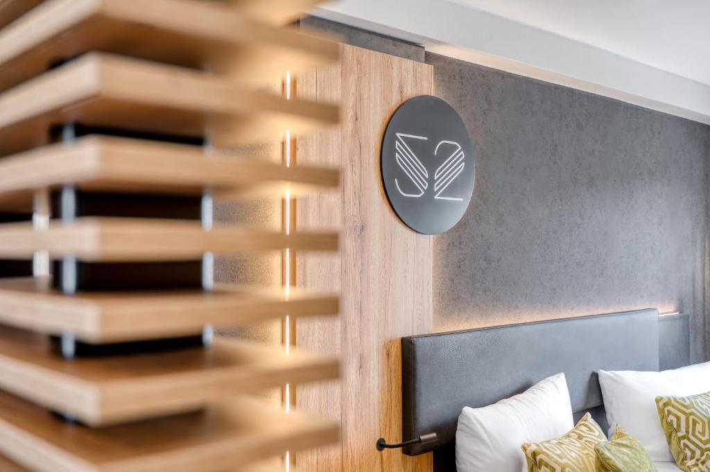 Postel nebo postele na pokoji v ubytování Hotel Schultheiss Hameln